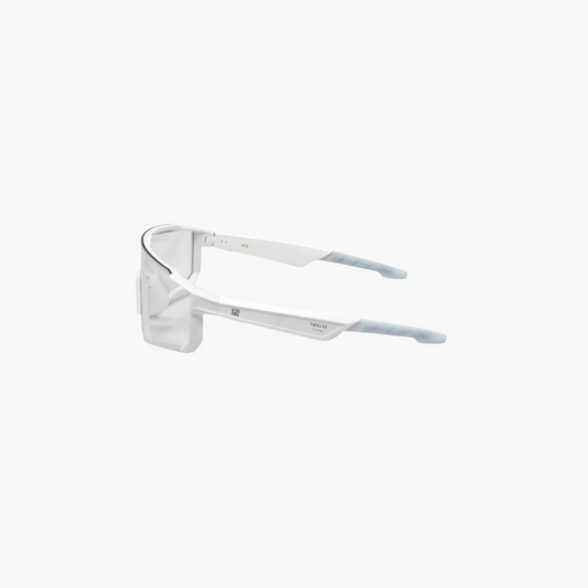 Clear sports glasses with photochromic lense on a white background