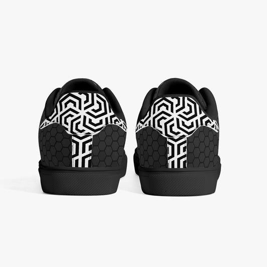 Black and white geometric patterned shoes on a white background