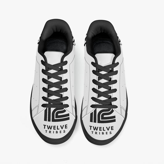 White sneakers with black accents and 'Twelve Tribes' branding on a white background