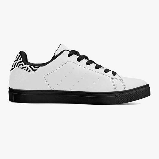 White sneaker with black accents on a white background