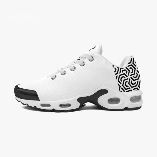 White sneaker with black and geometric pattern on a white background