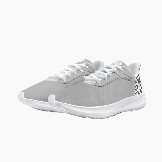 Gray athletic shoes with white laces on a white background