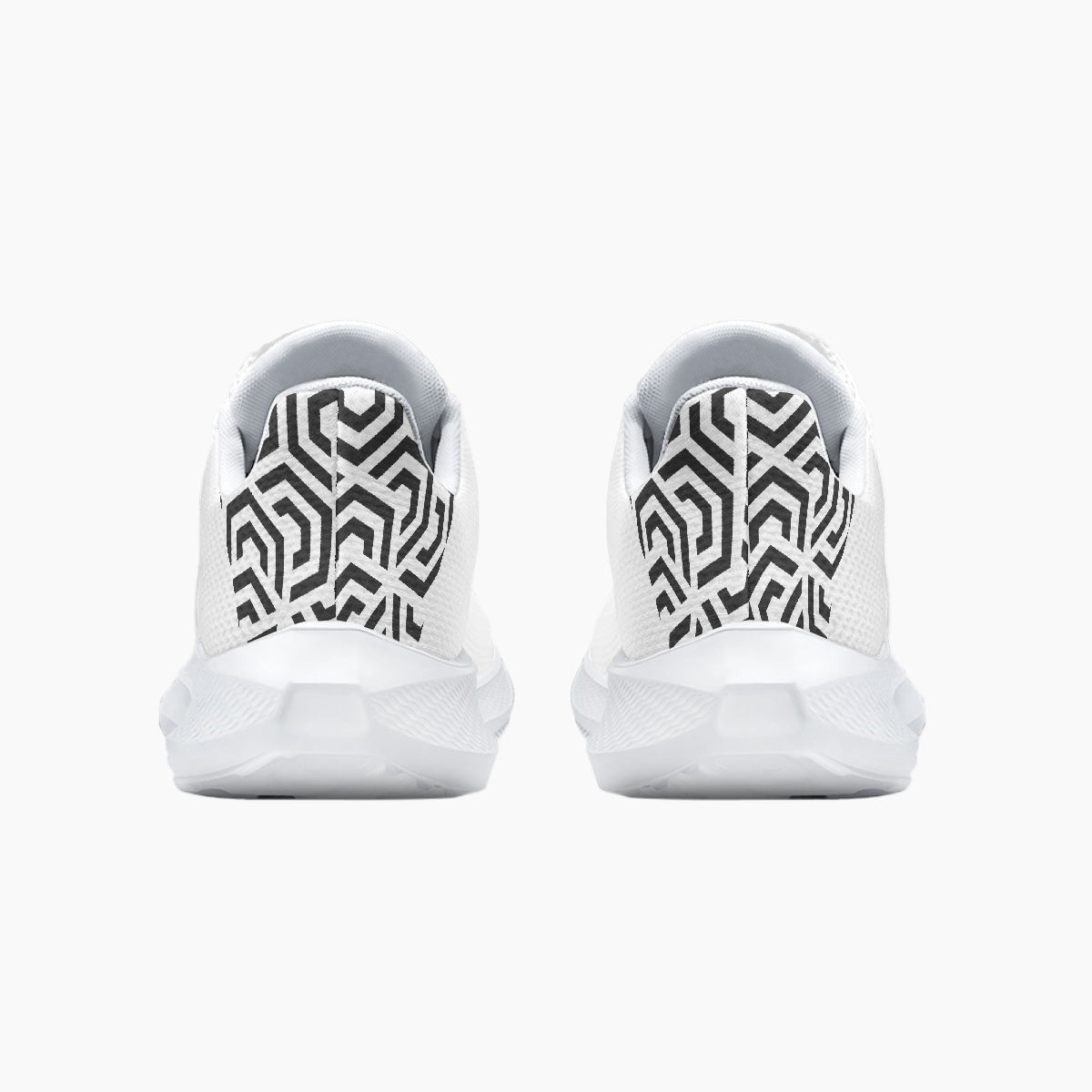 White sneakers with black geometric pattern on a white background