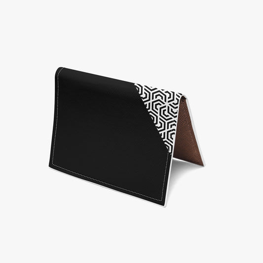 Black leather stand with geometric patterned corner on a white background
