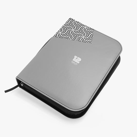 Gray organizer with a patterned flap on a white background