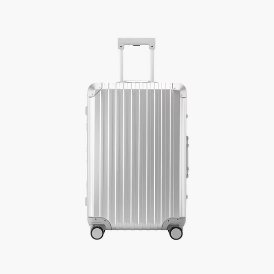 Silver suitcase with a striped pattern on a white background