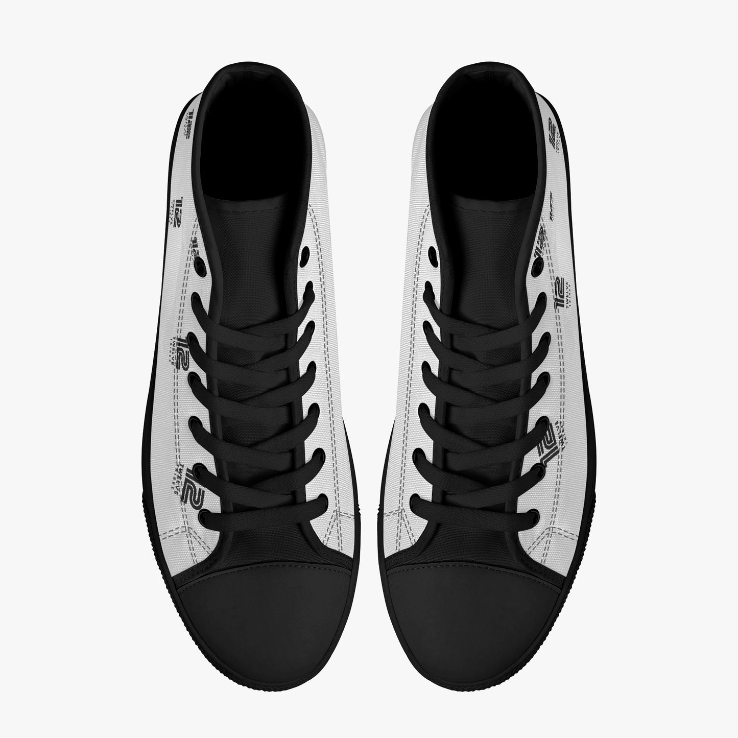 Black and white high-top sneakers on a light gray background