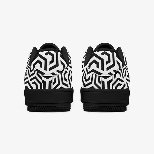 Black and white geometric patterned sneakers on a white background