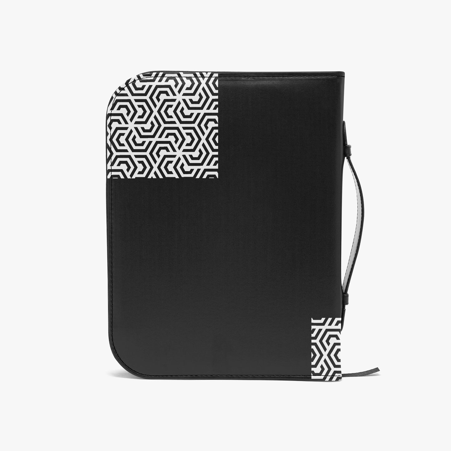 Black and white patterned pouch with a strap on a light gray background