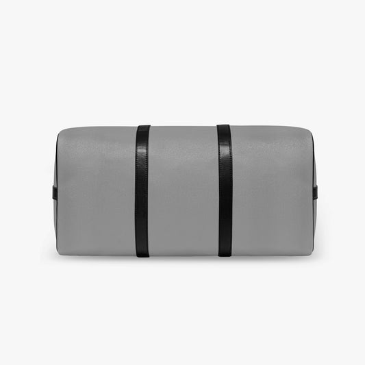 Gray cylindrical bag with black straps on a white background