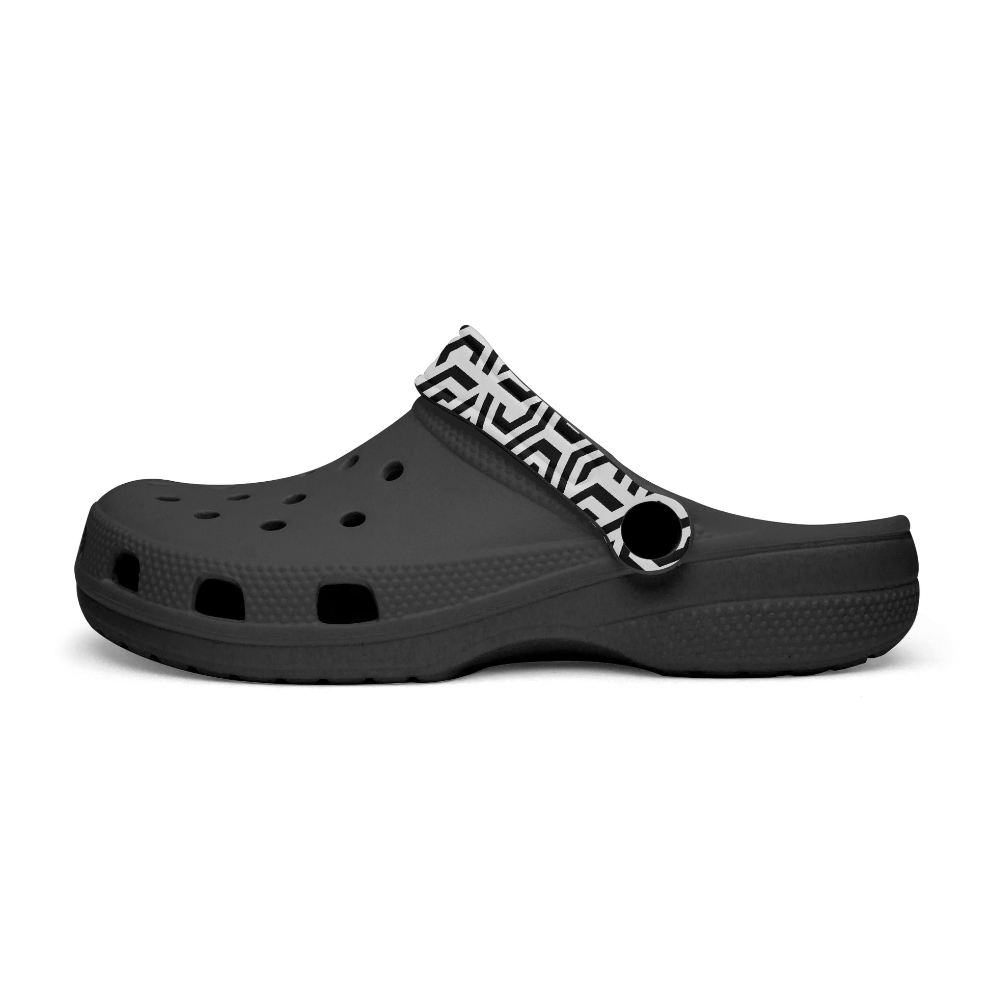Black clog shoe with a patterned strap on a white background
