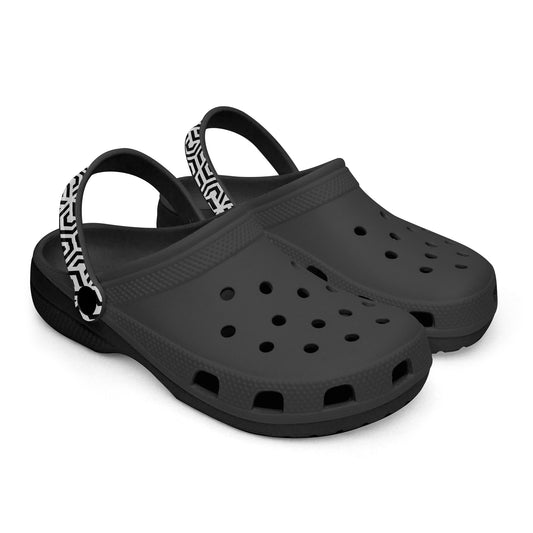 Black clogs with a strap on a white background