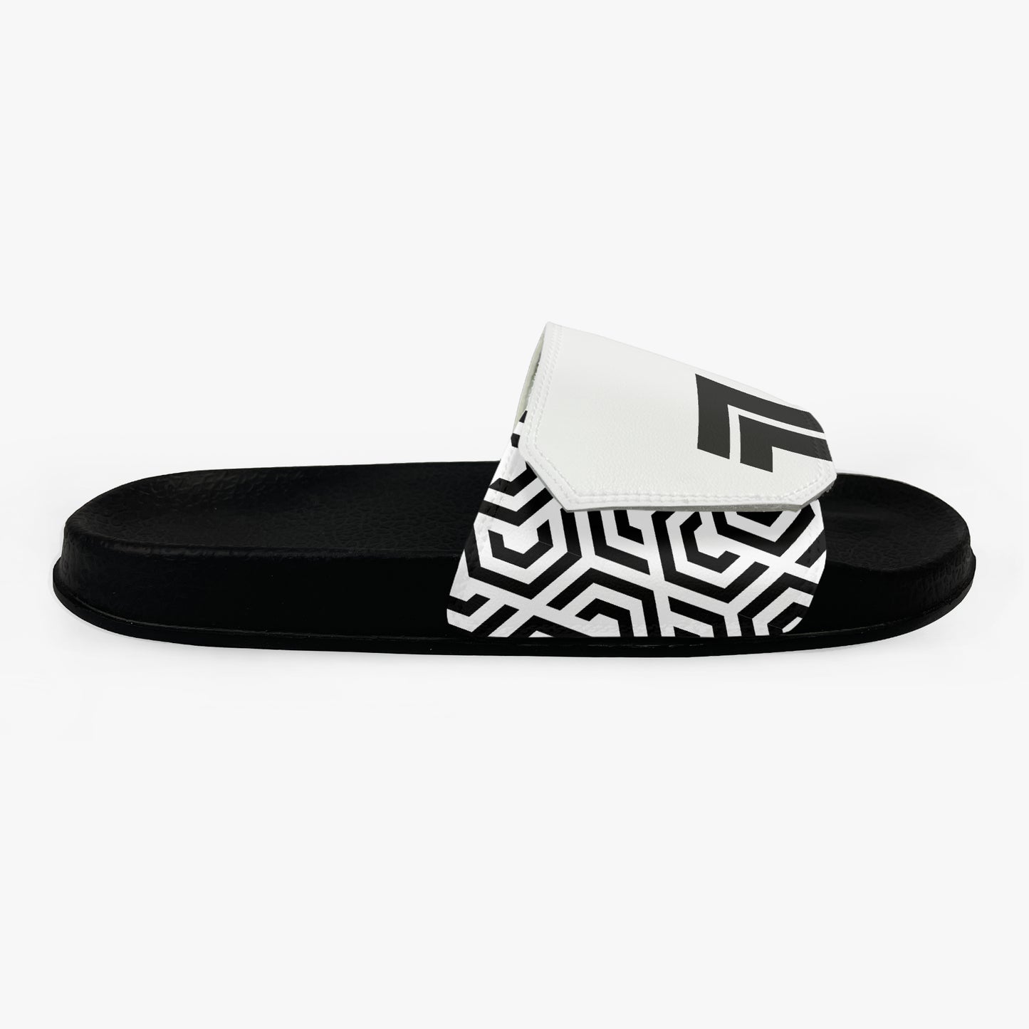 Black slide sandal with a white strap featuring a geometric pattern on a white background