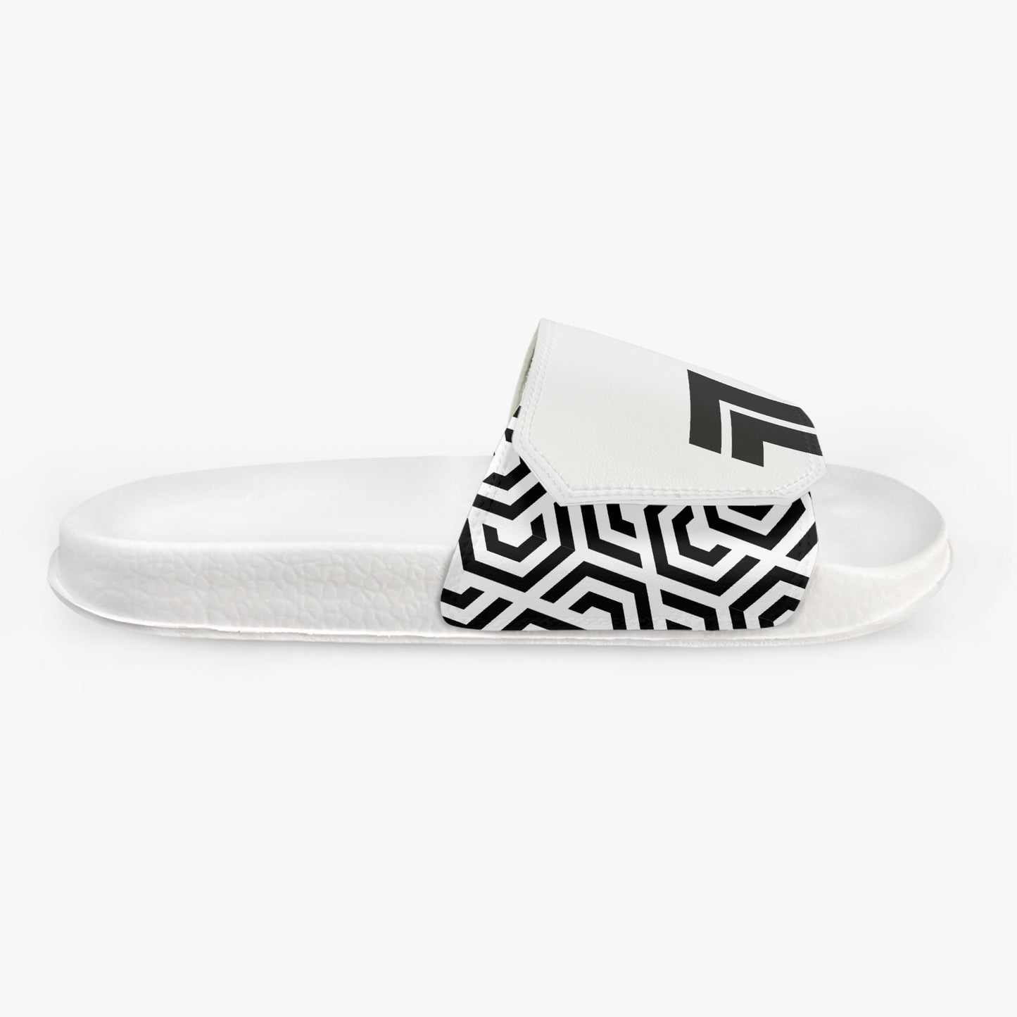 White slide sandal with black geometric pattern on a white background