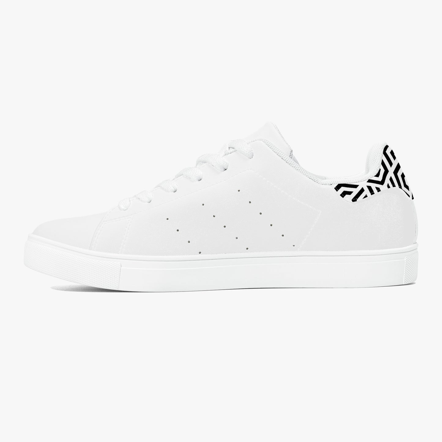 White sneaker with a black logo on a white background