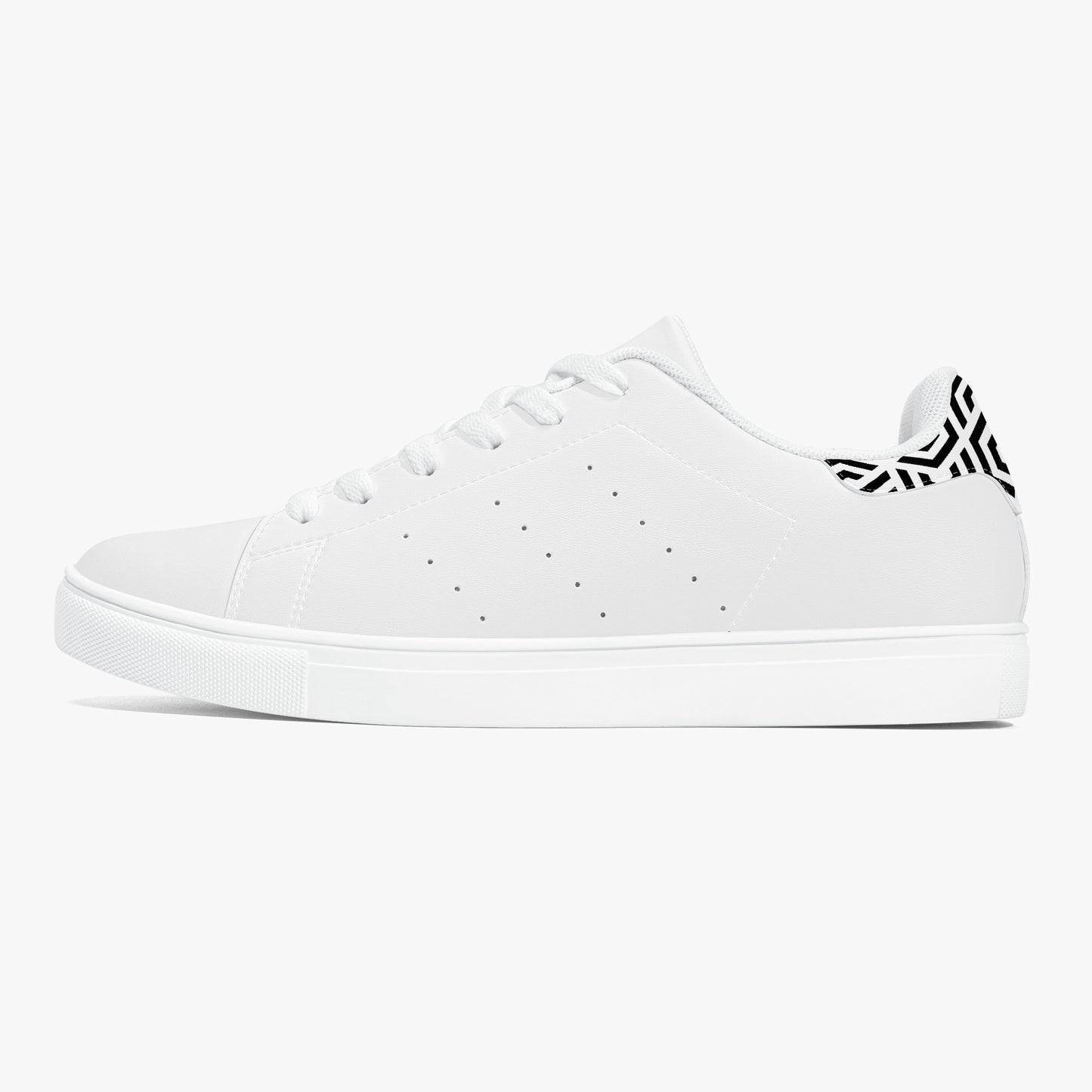 White sneaker with black logo on a white background