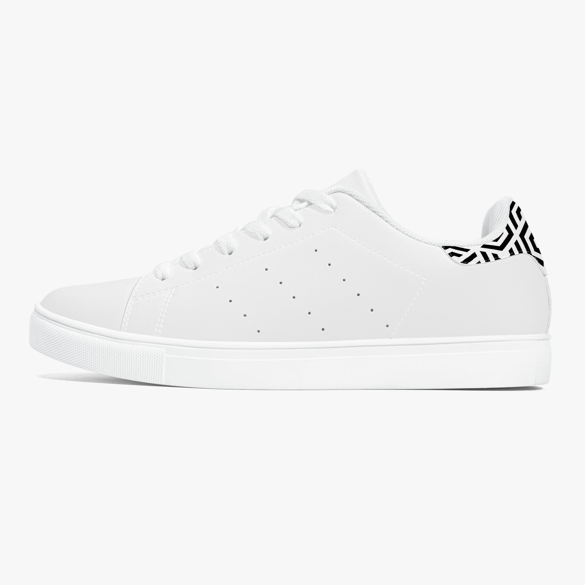 White sneaker with black logo on a white background