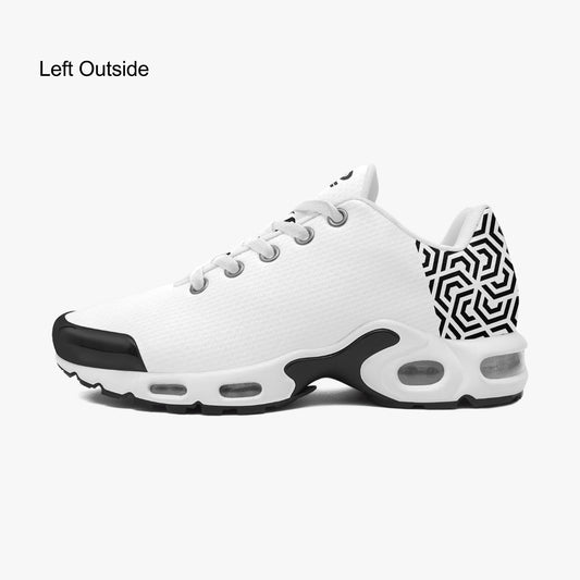 White sneaker with black and geometric pattern on a white background
