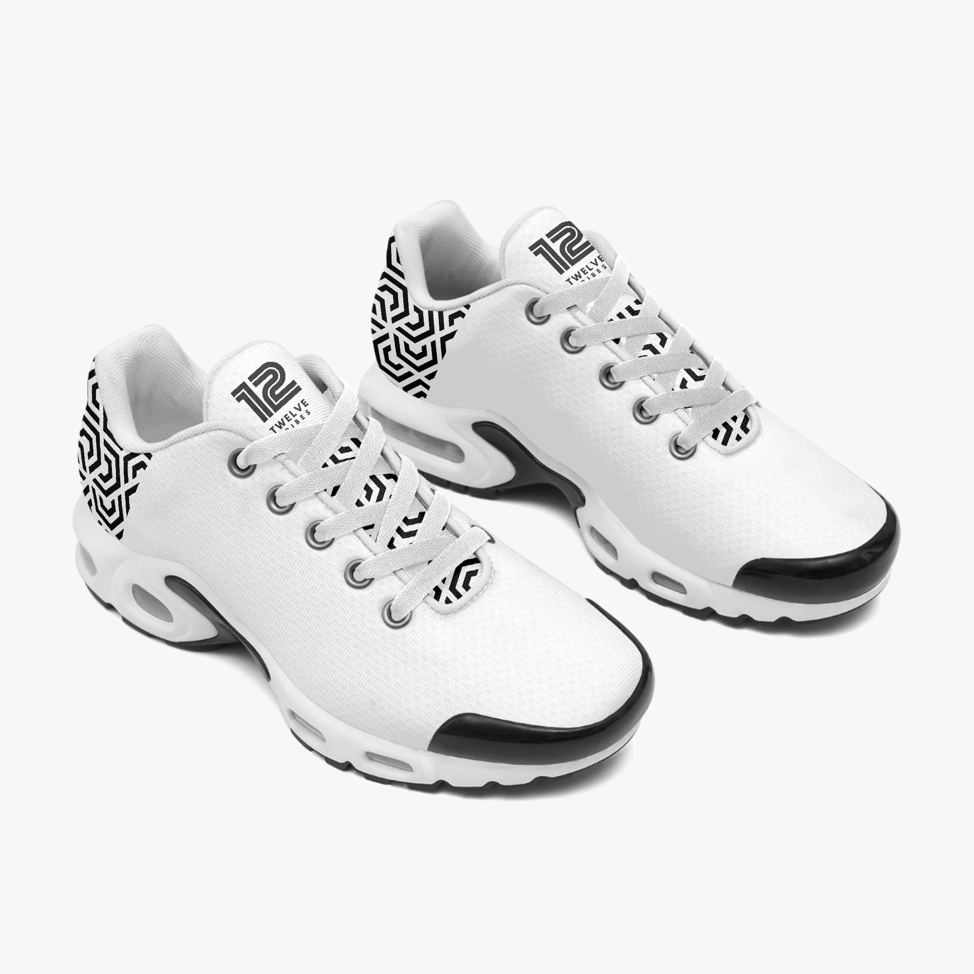 White sneakers with black accents on a white background