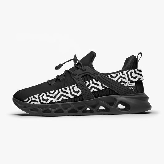 Black and white sneaker with geometric pattern on a white background