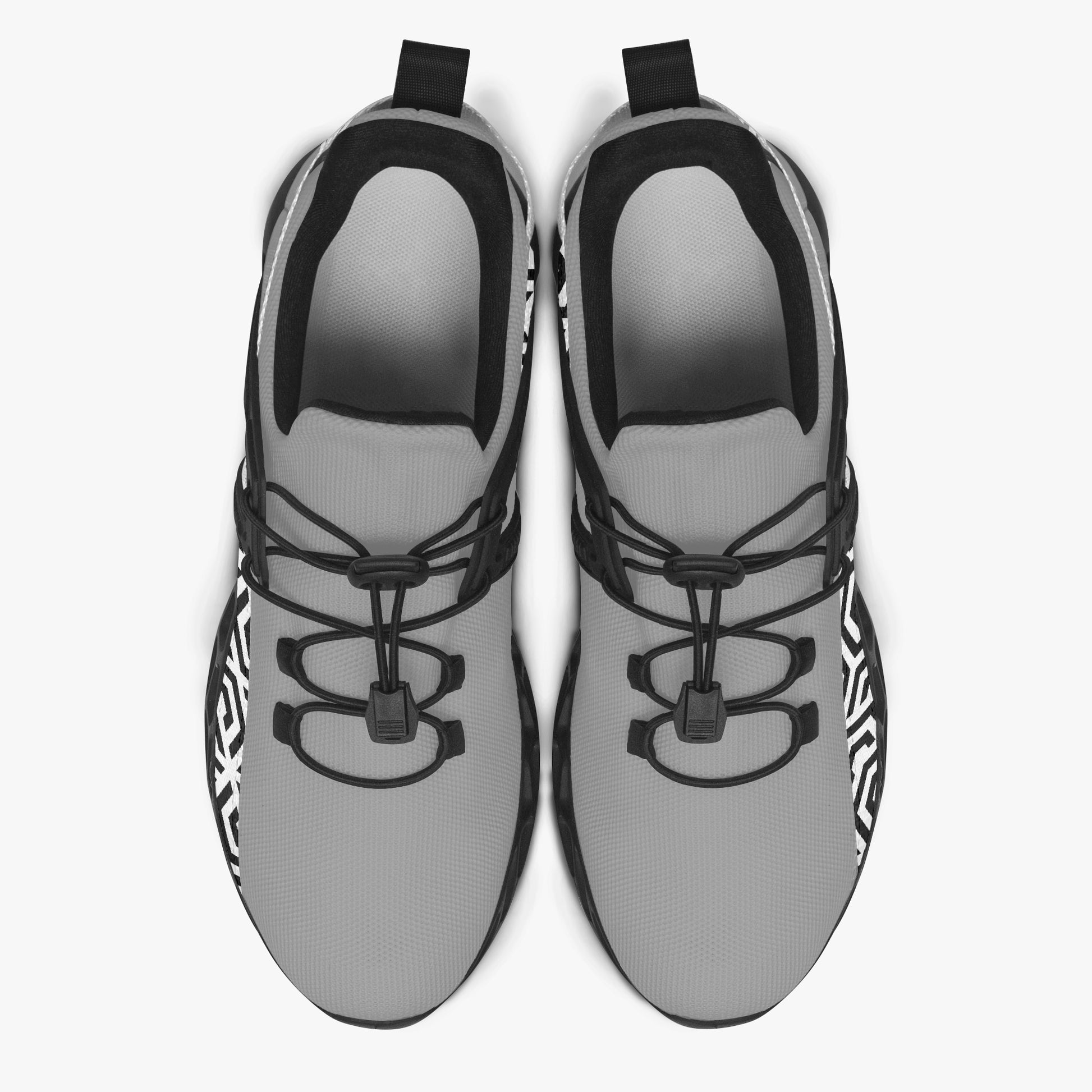 Gray sneakers with black and white pattern on a white background