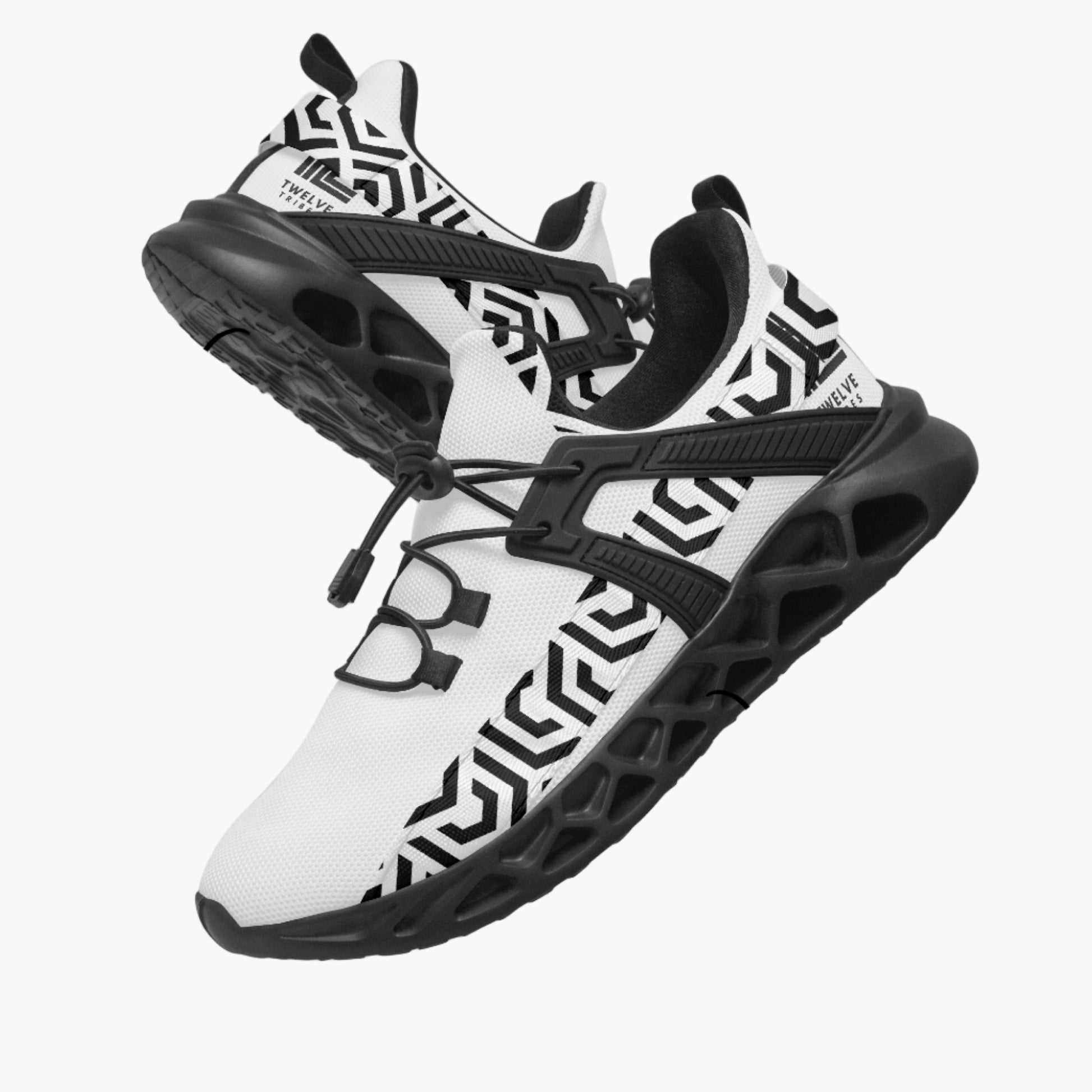 White and black athletic shoes with geometric patterns on a white background