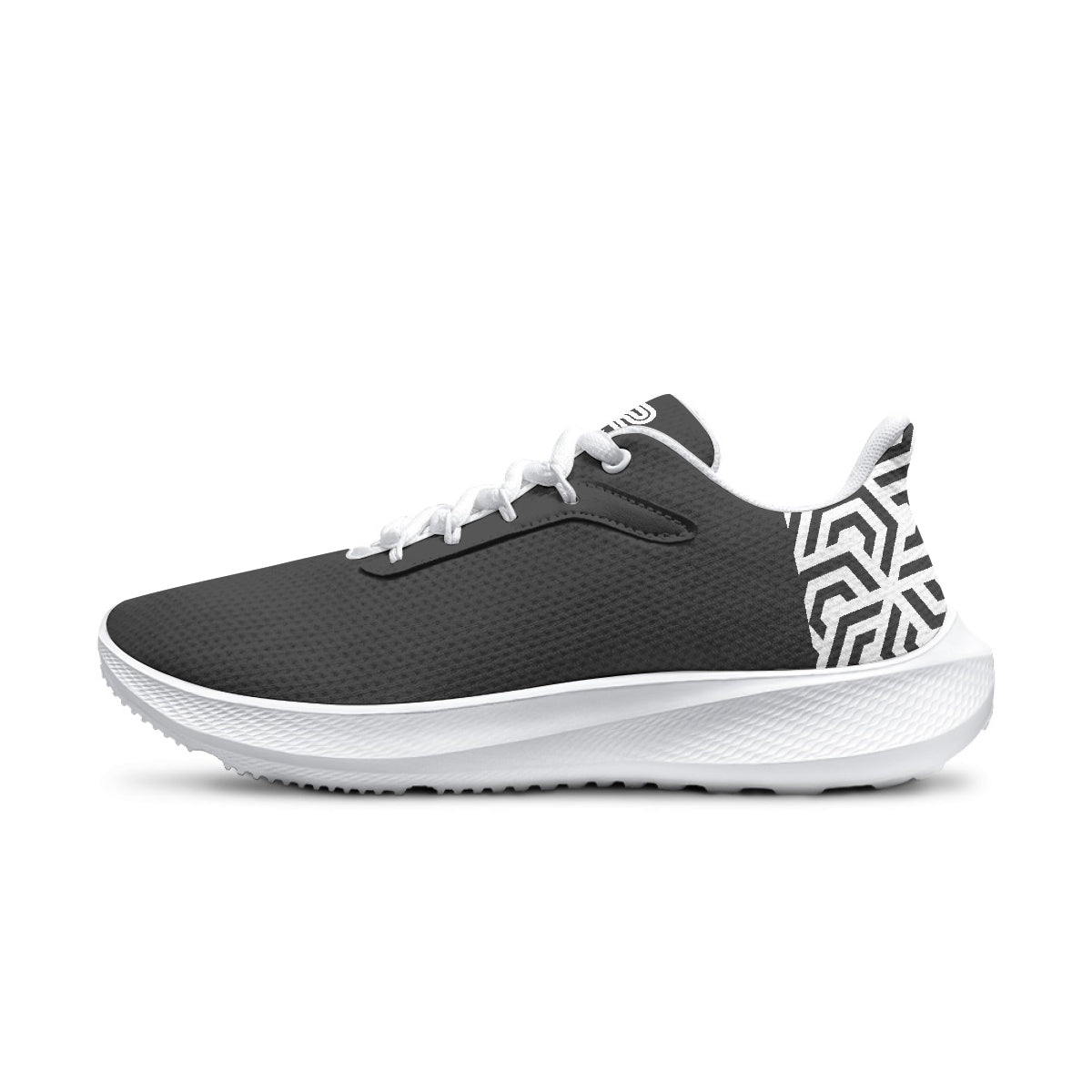 Black and white athletic shoe with geometric pattern on a white background