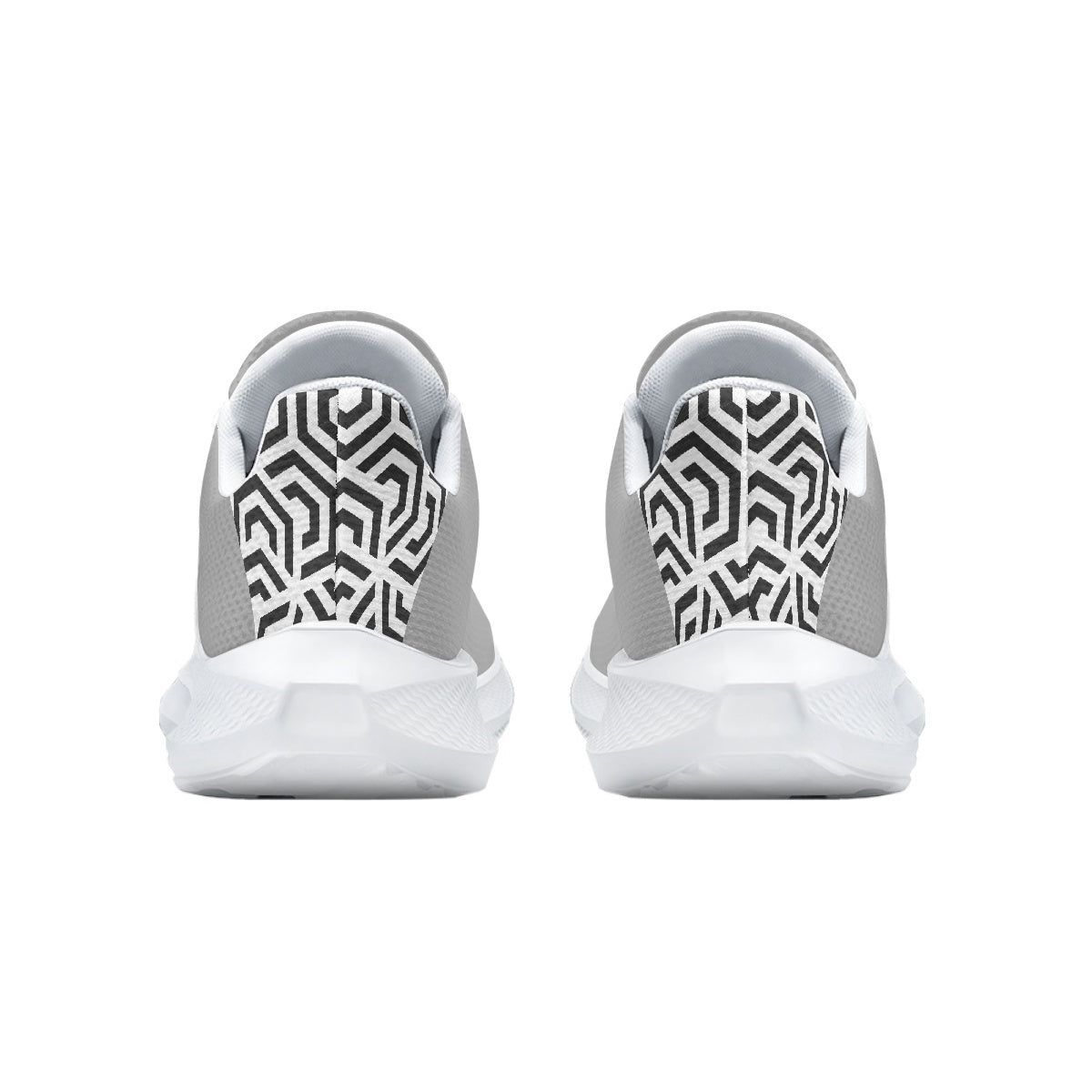 White sneakers with black geometric pattern on a white background