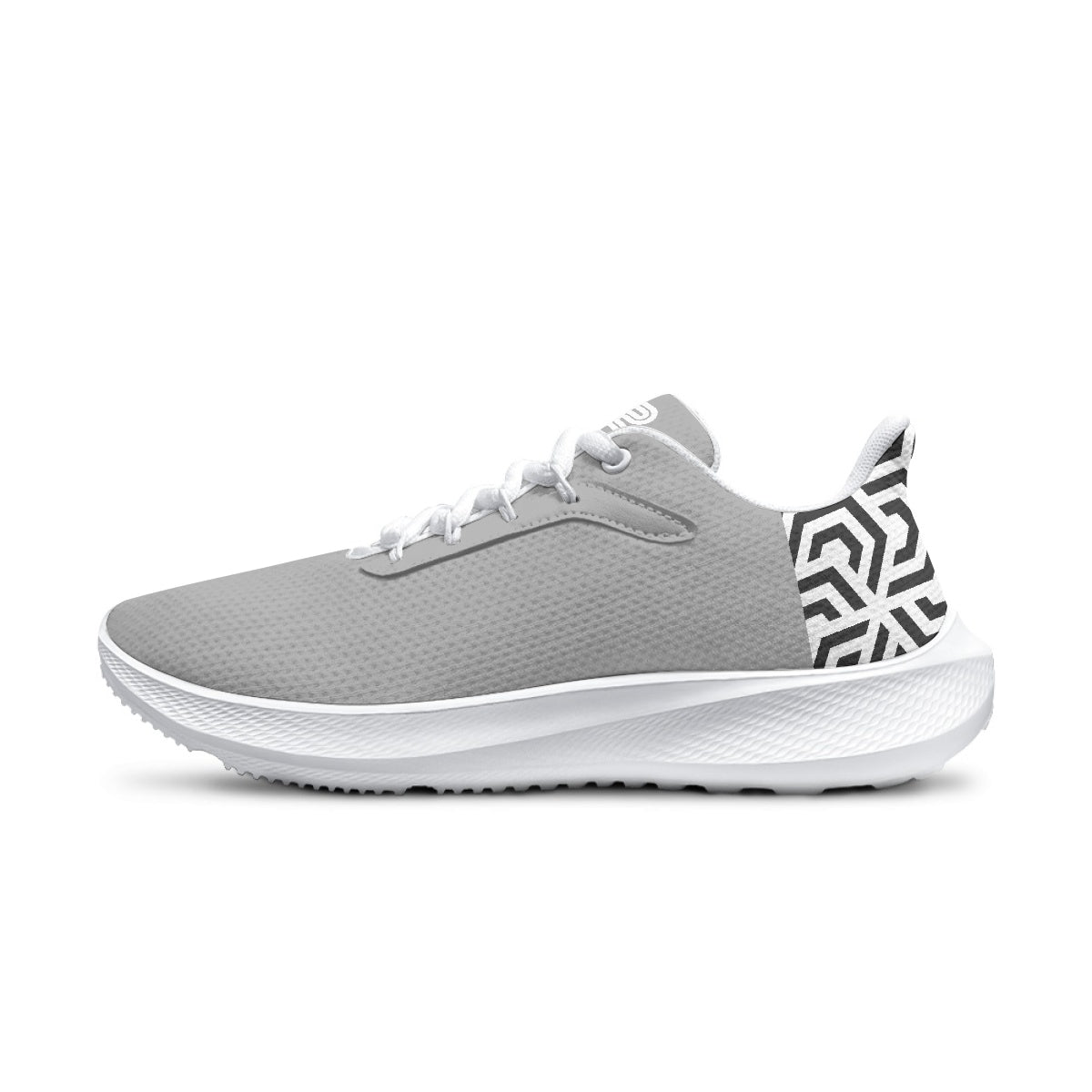 Gray athletic shoe with white sole on a white background