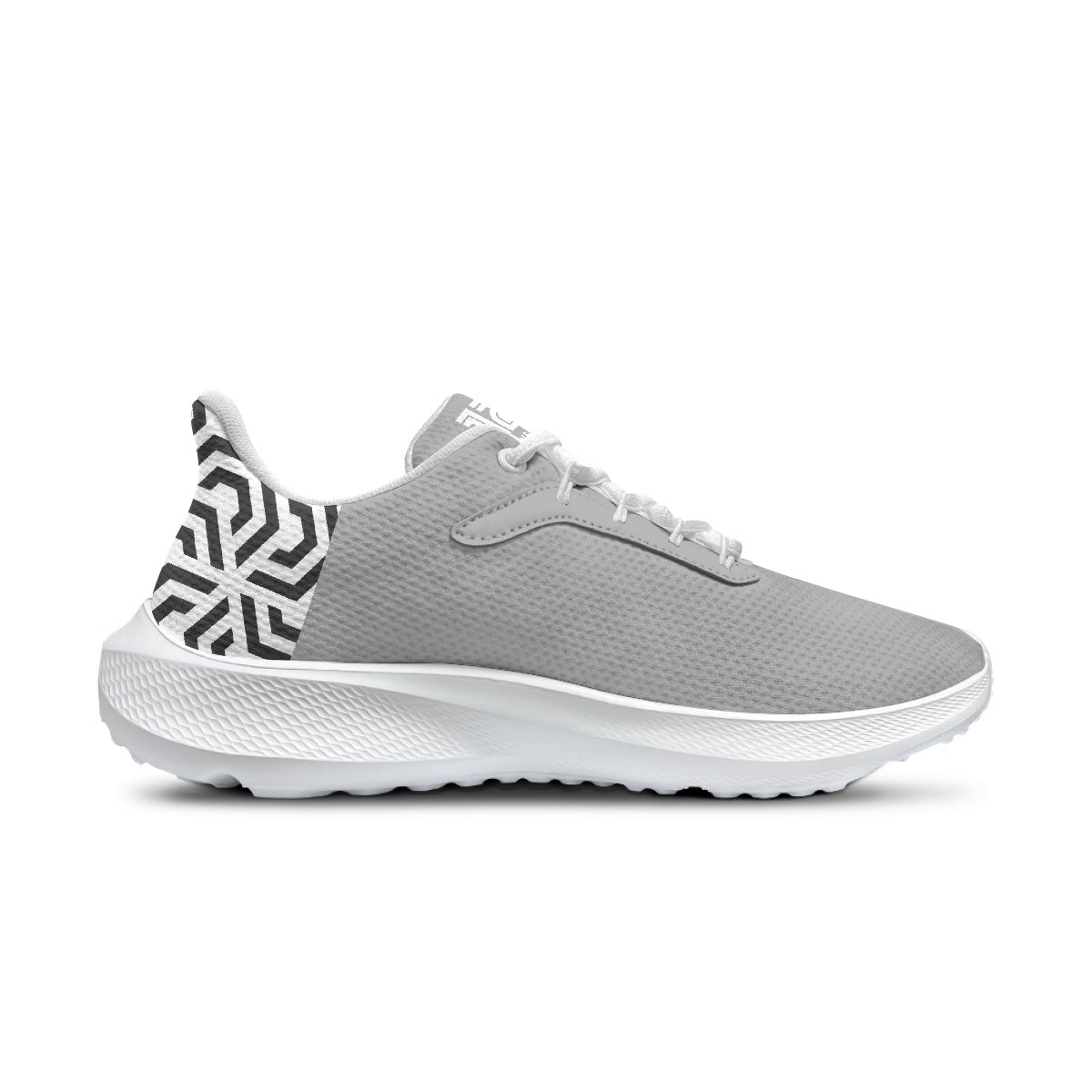 Gray sneaker with white sole on a white background