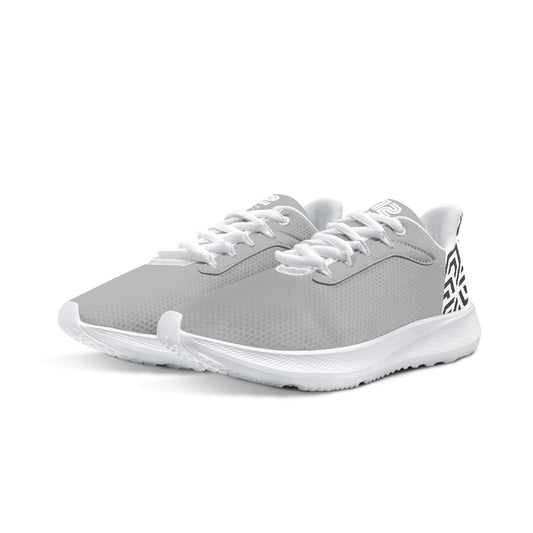 Gray athletic shoes with white laces on a white background