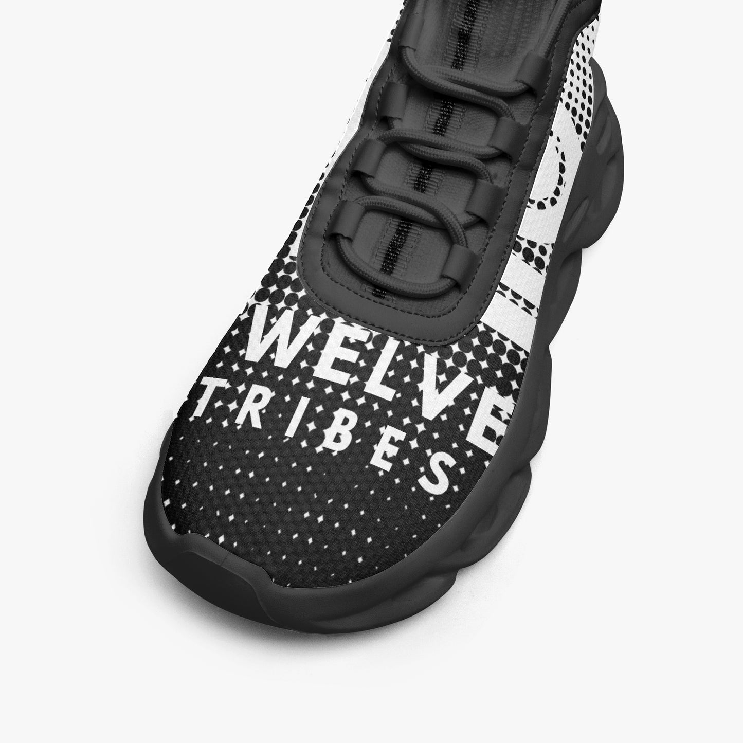 Black and white sneaker with 'TWELVE TRIBES' branding on a light gray background