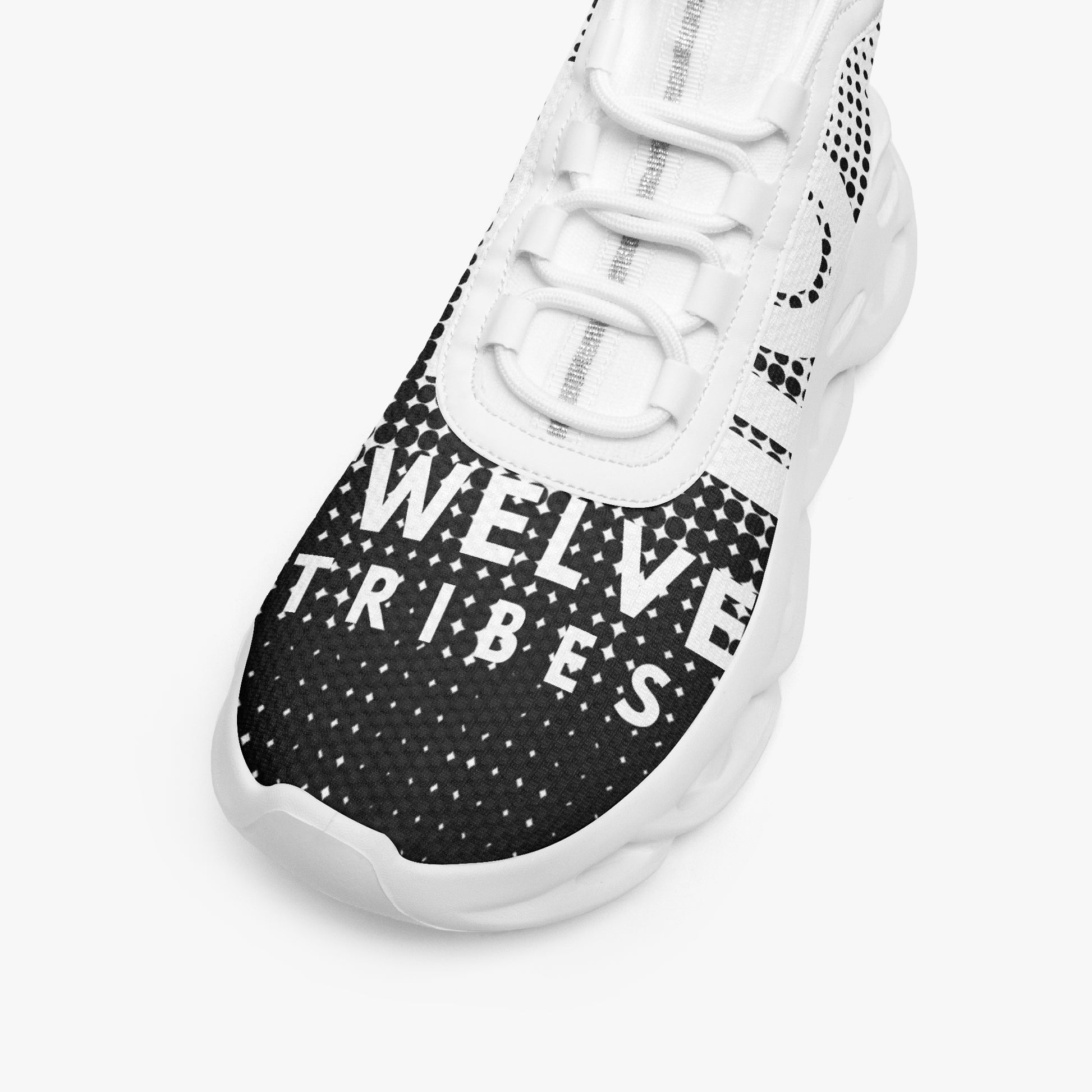 White sneaker with '12 TRIBES' text on a black background