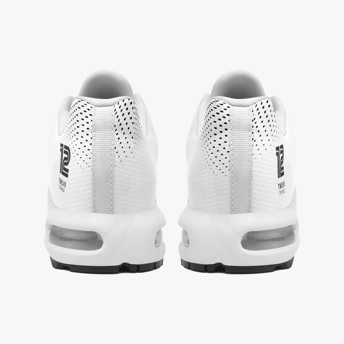 White sneakers with visible New Balance logo on a white background