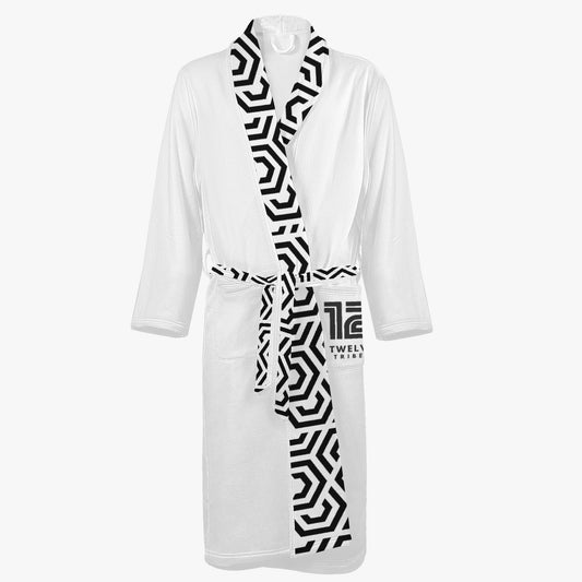 White robe with black geometric pattern on a white background