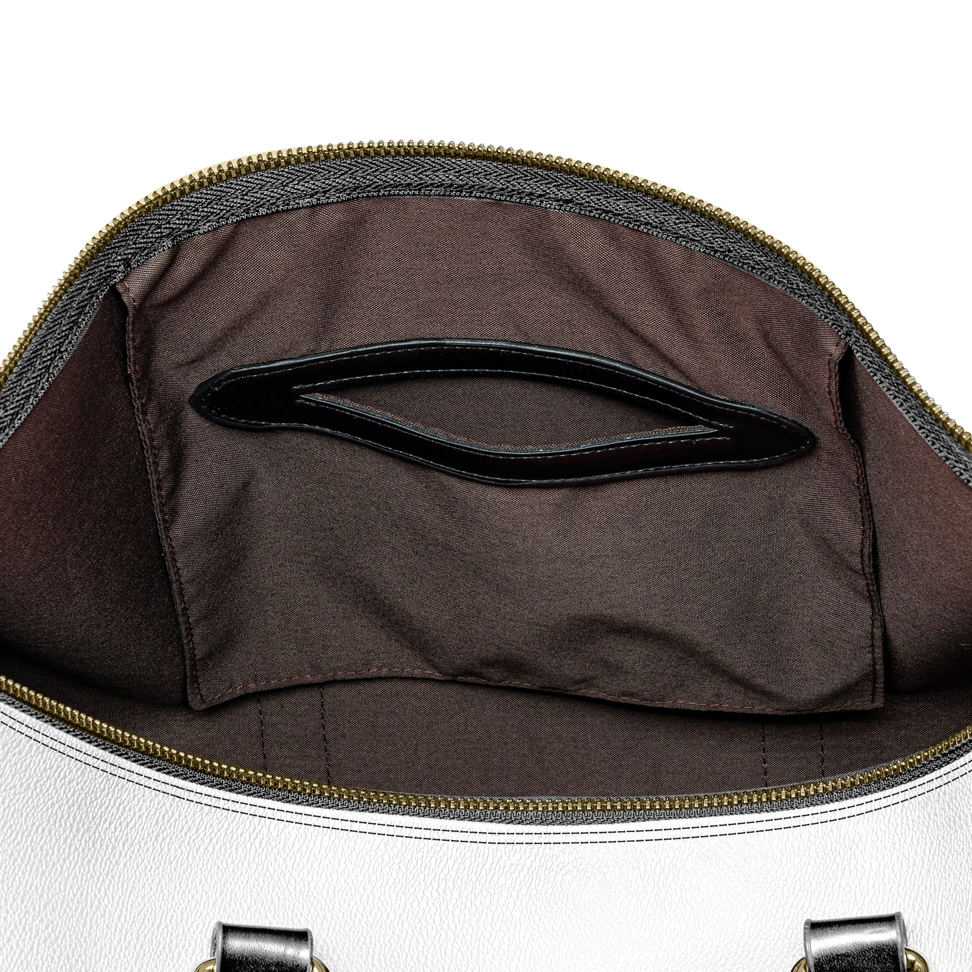 Close-up of a bag's interior with a handle and zipper.