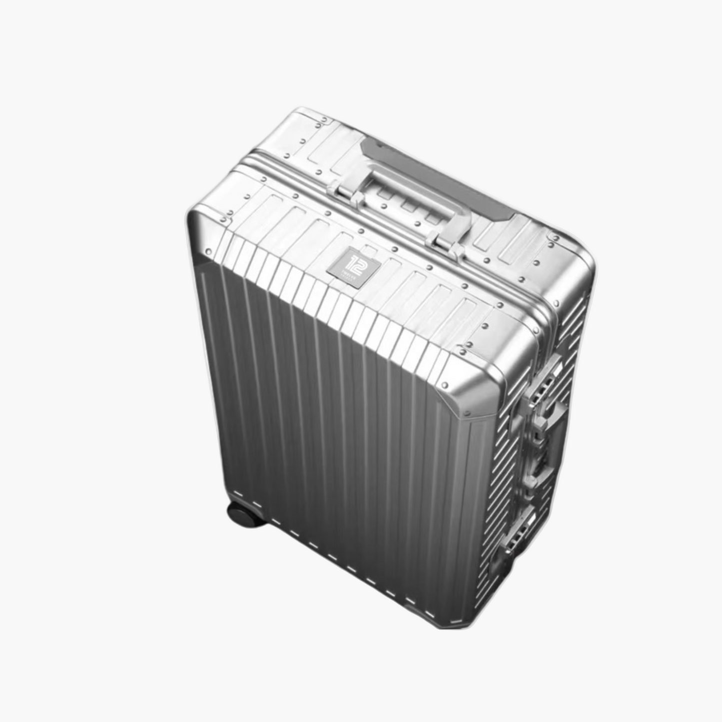 Silver suitcase with a textured surface on a white background