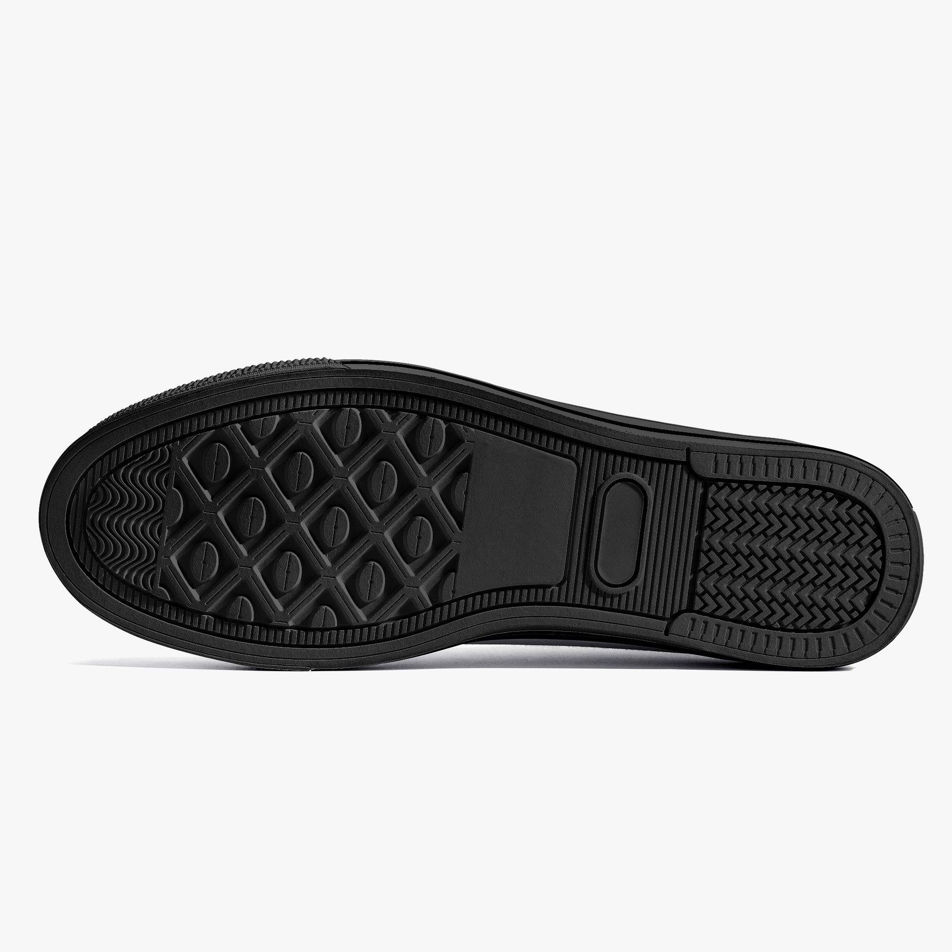 Black shoe sole with tread pattern on a white background