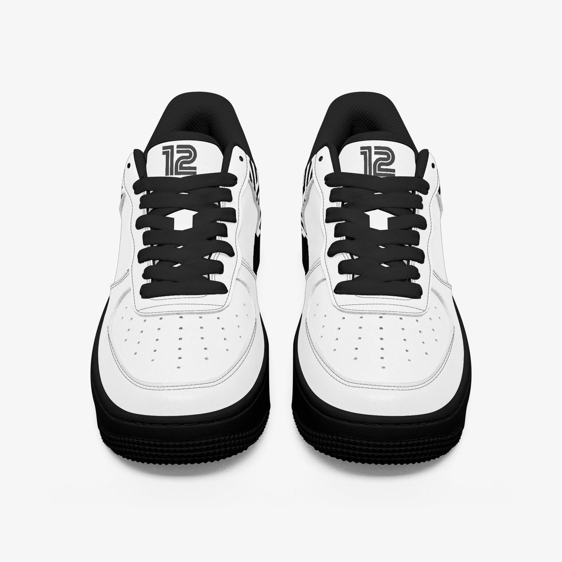White sneakers with black accents on a white background