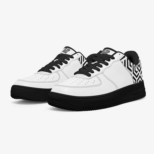 White sneakers with black accents and geometric pattern on a white background