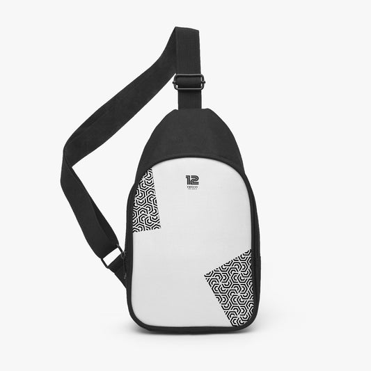 Black and white sling bag with geometric patterns on a light gray background
