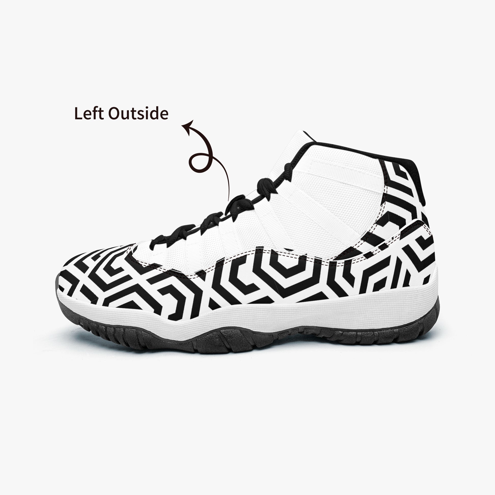 White sneaker with black geometric pattern on a white background